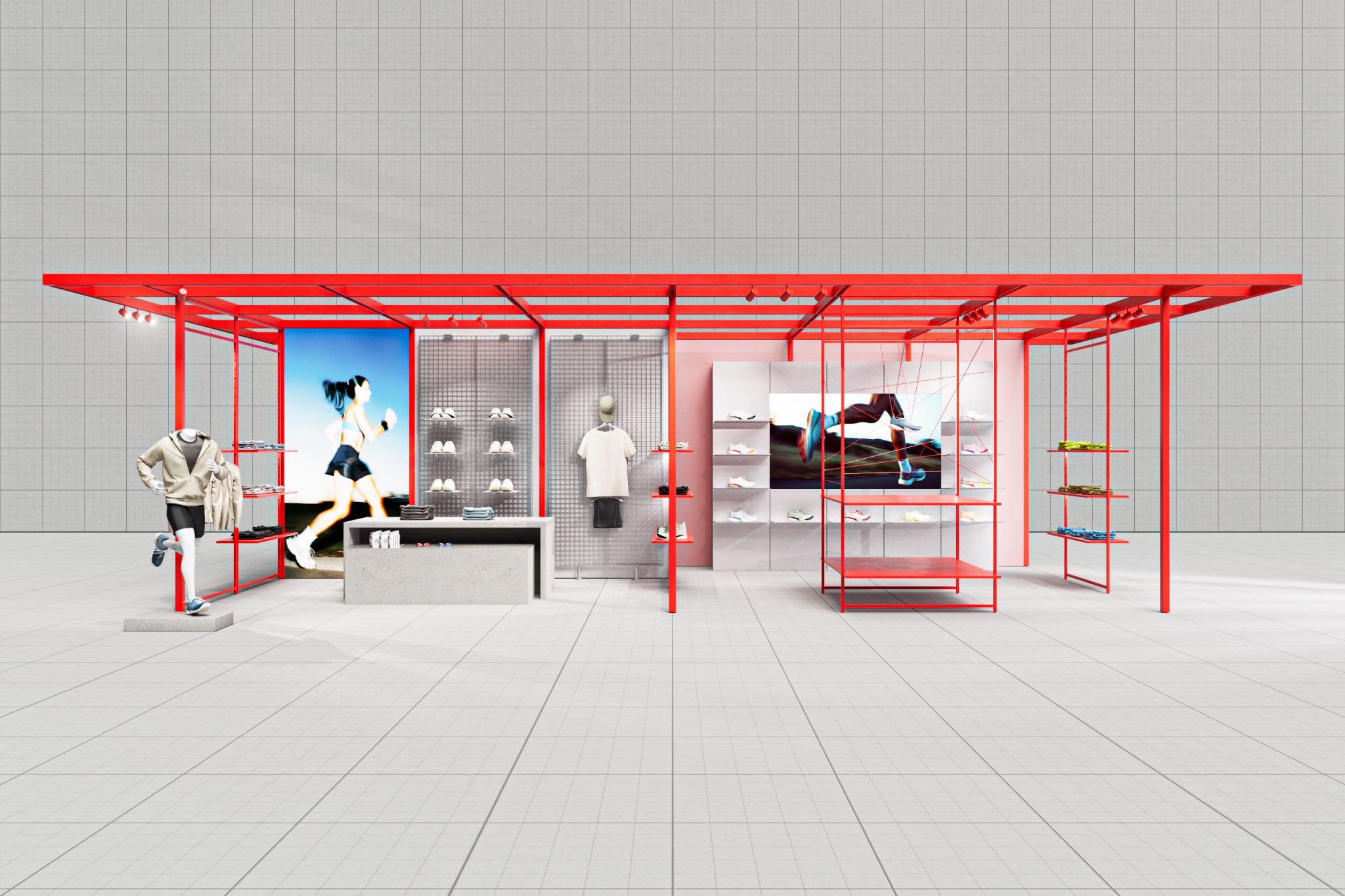 Red freestanding display system with sportswear, shoes, and large sports photos on the back wall in a bright room.