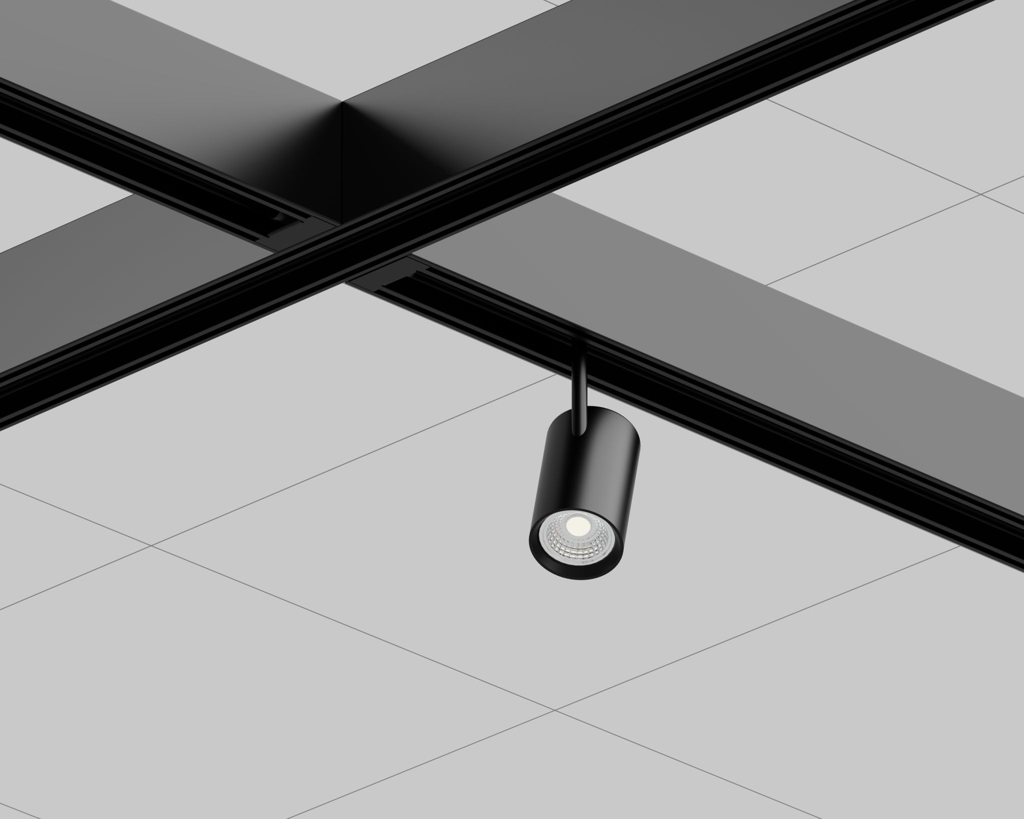 Black metal ceiling structure with a cylindrical spotlight pointing downward.