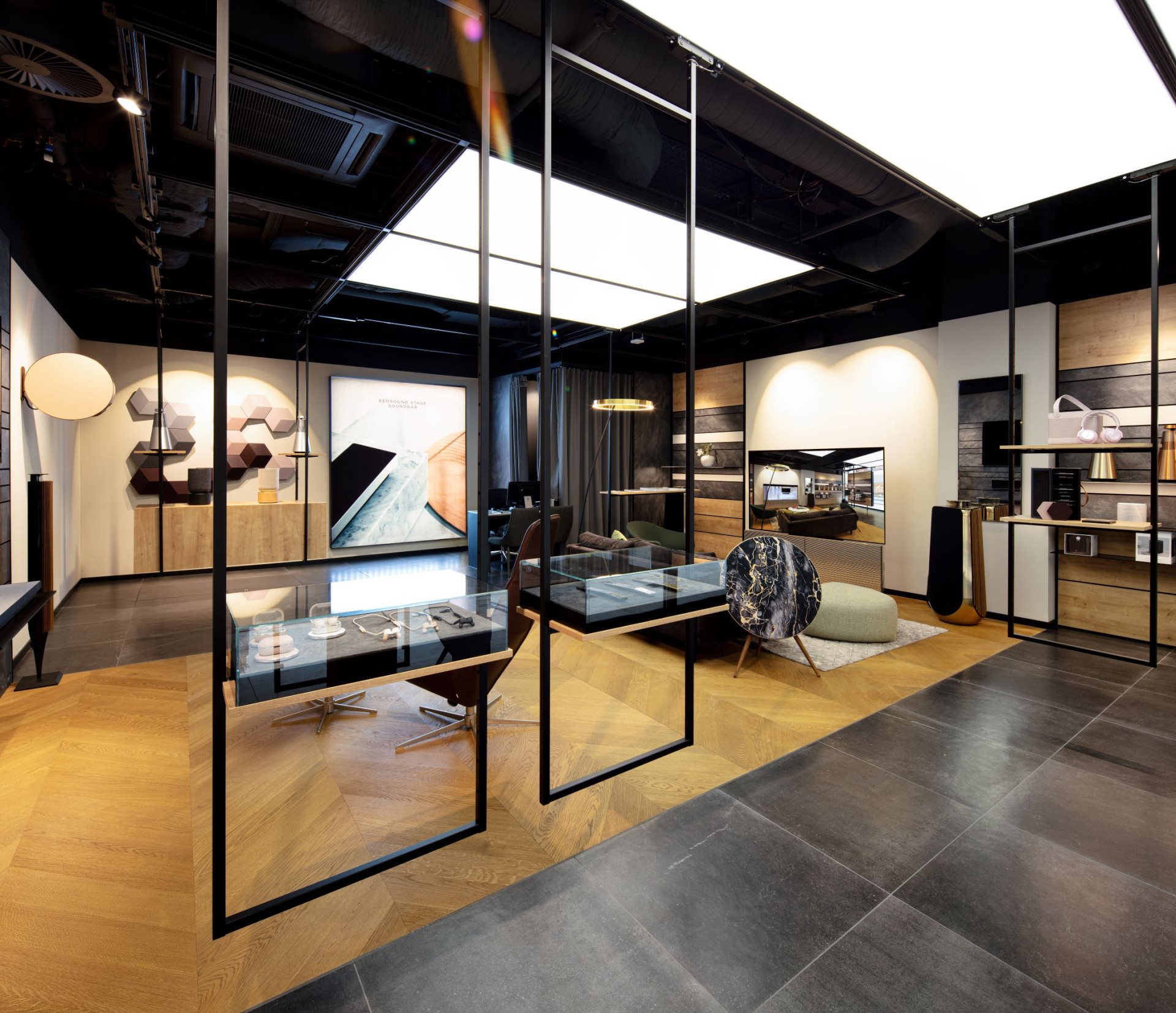 Elegant commercial space with goods carriers hanging from the ceiling.