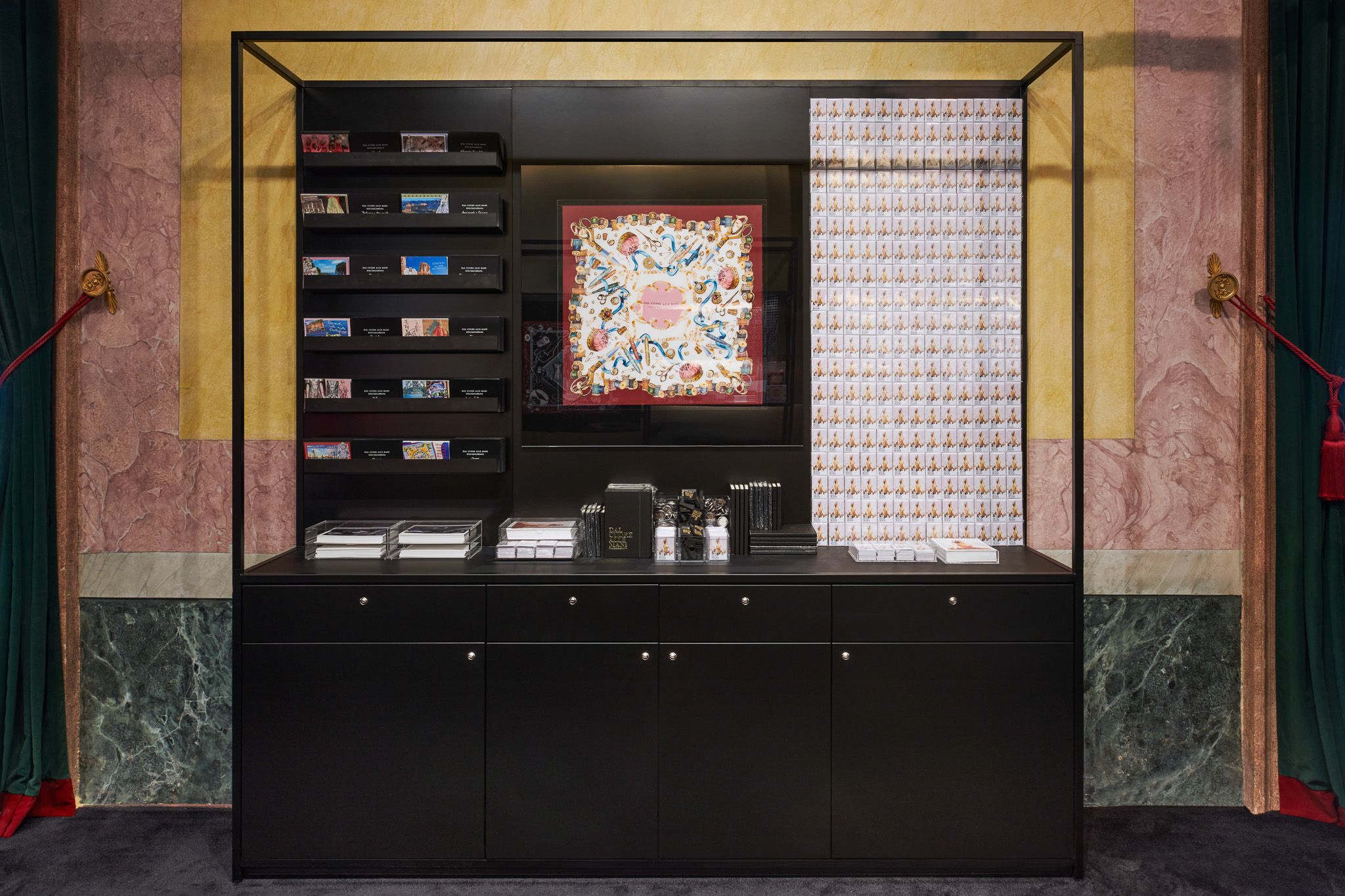 Visplay's shelving and structural system showcases the high-quality merchandise of Dolce&amp;Gabbana at the Palazzo Reale.