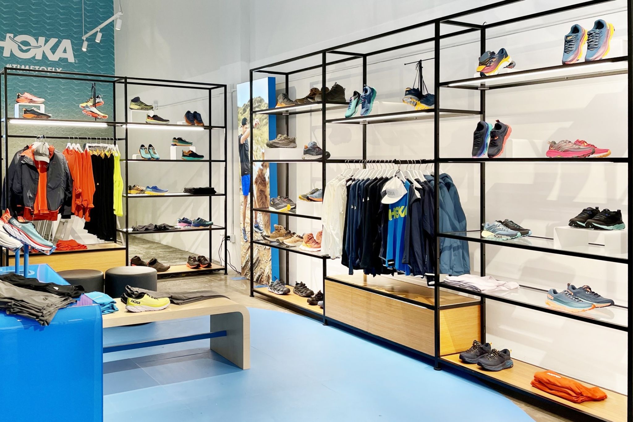Shelves of goods in a store equipped with sportswear.