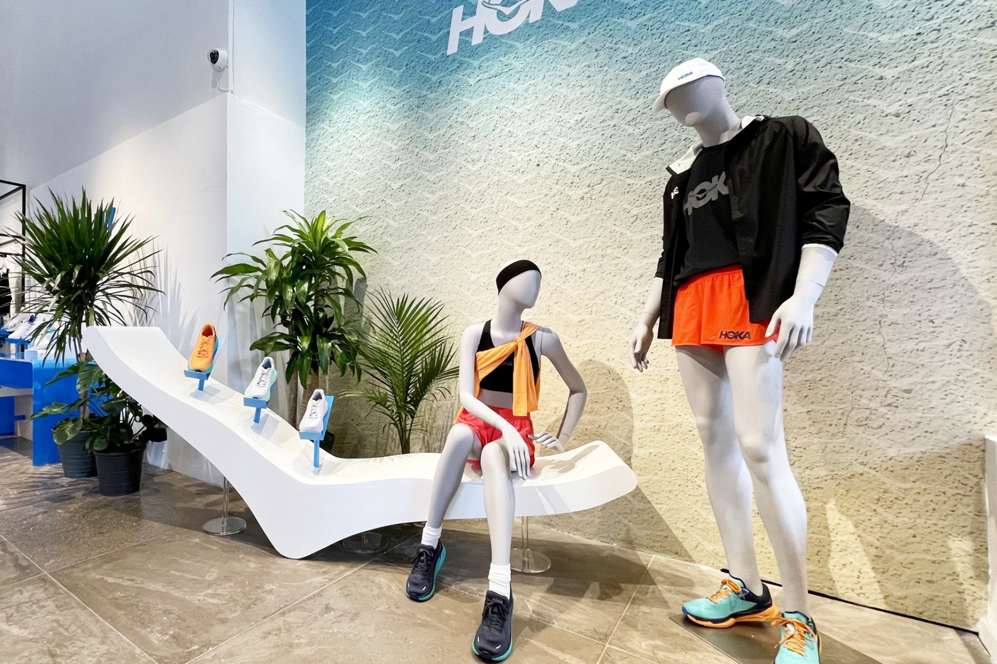 Two mannequins with summer sportswear.