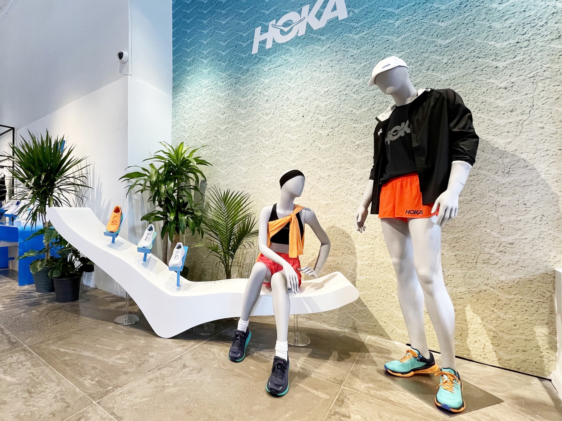Two mannequins with summer sportswear.
