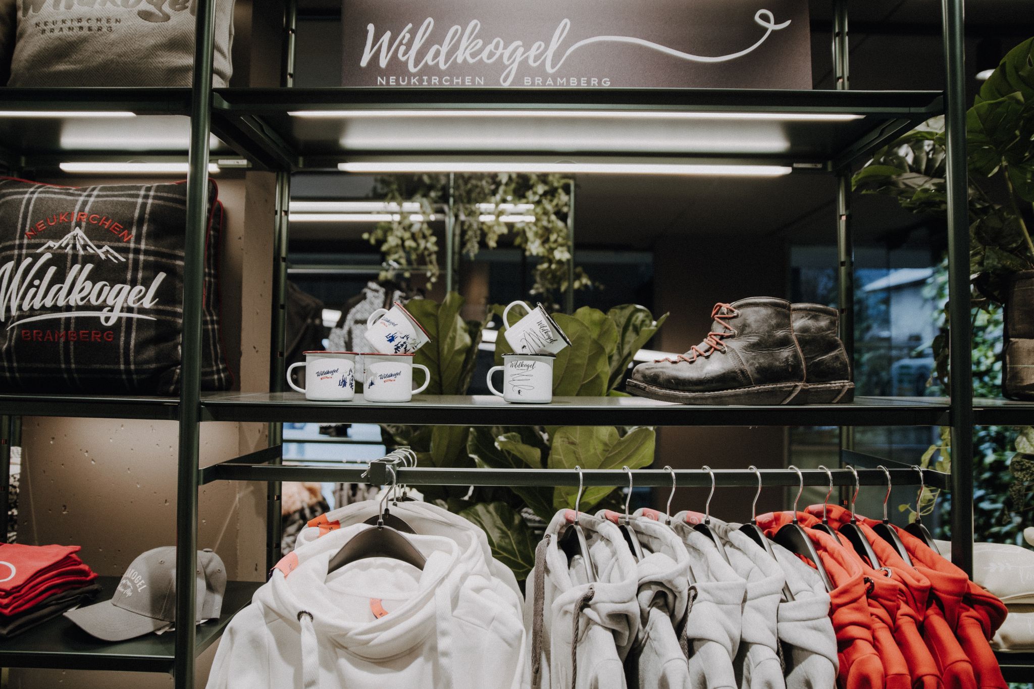 Open shelving system in a sports store for high-quality product presentation.