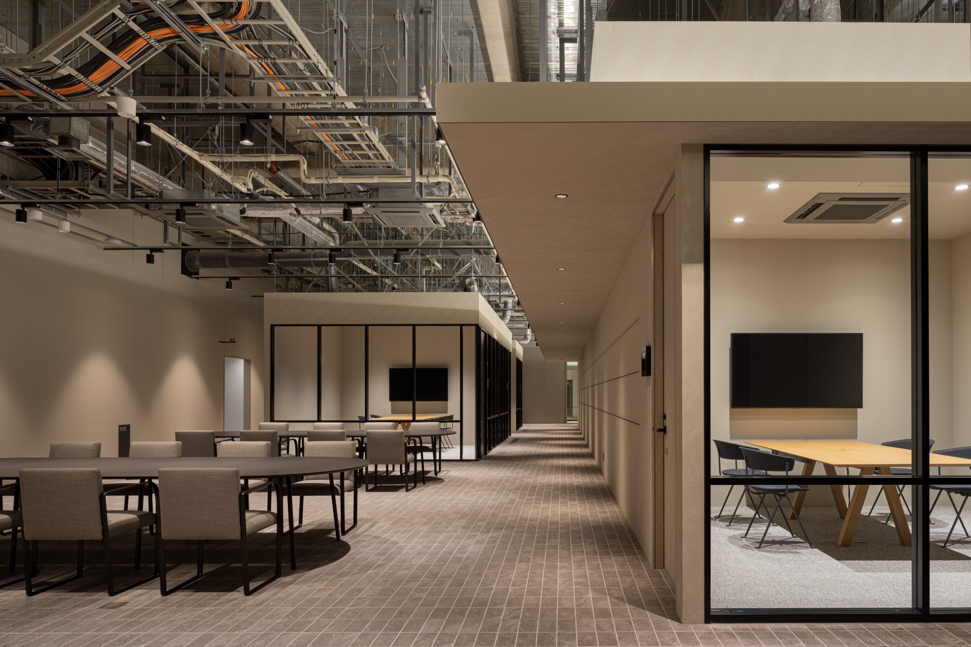 A bright room with meeting tables.