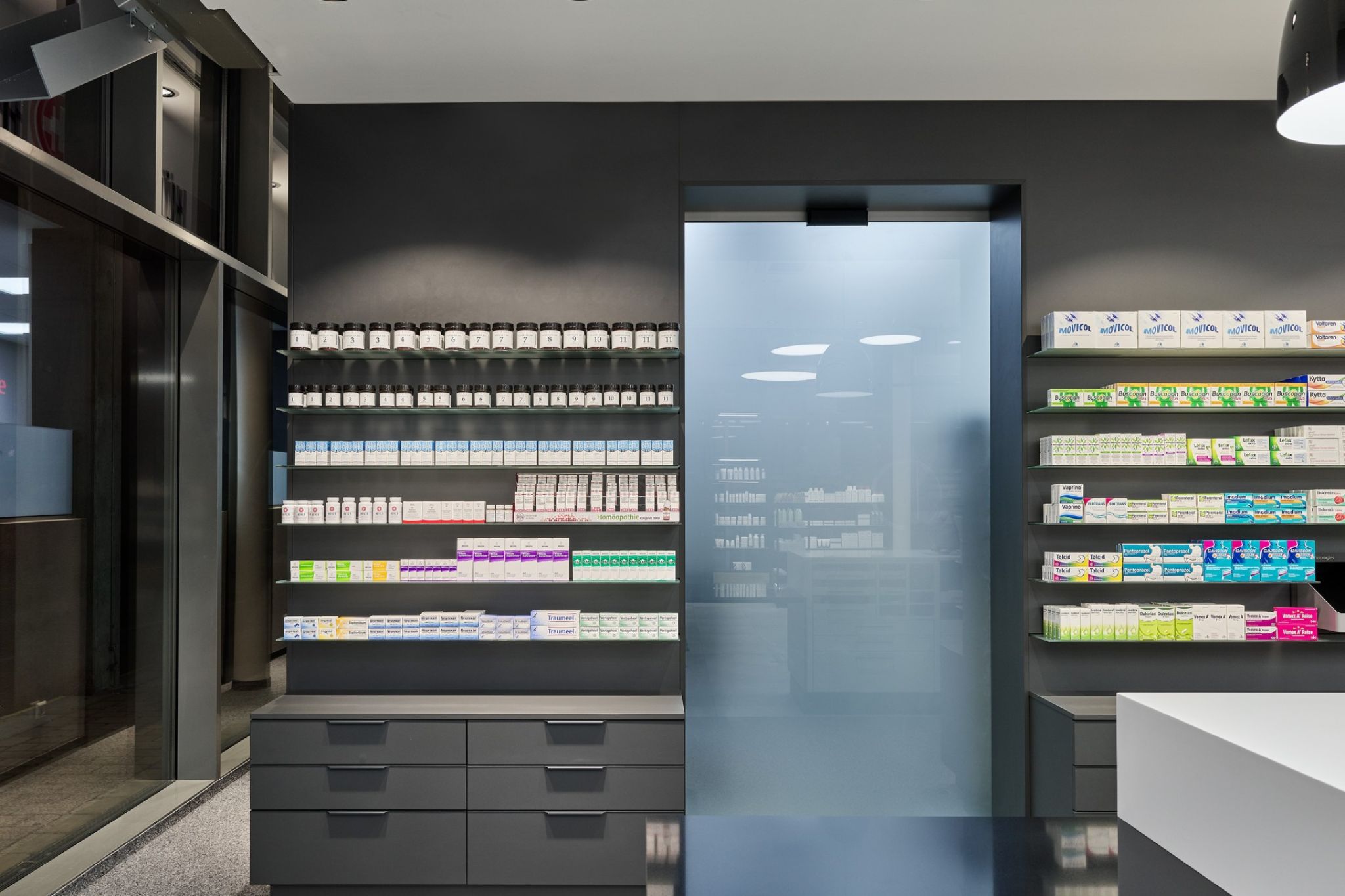 Checkout area of a pharmacy with focus on sight selection.