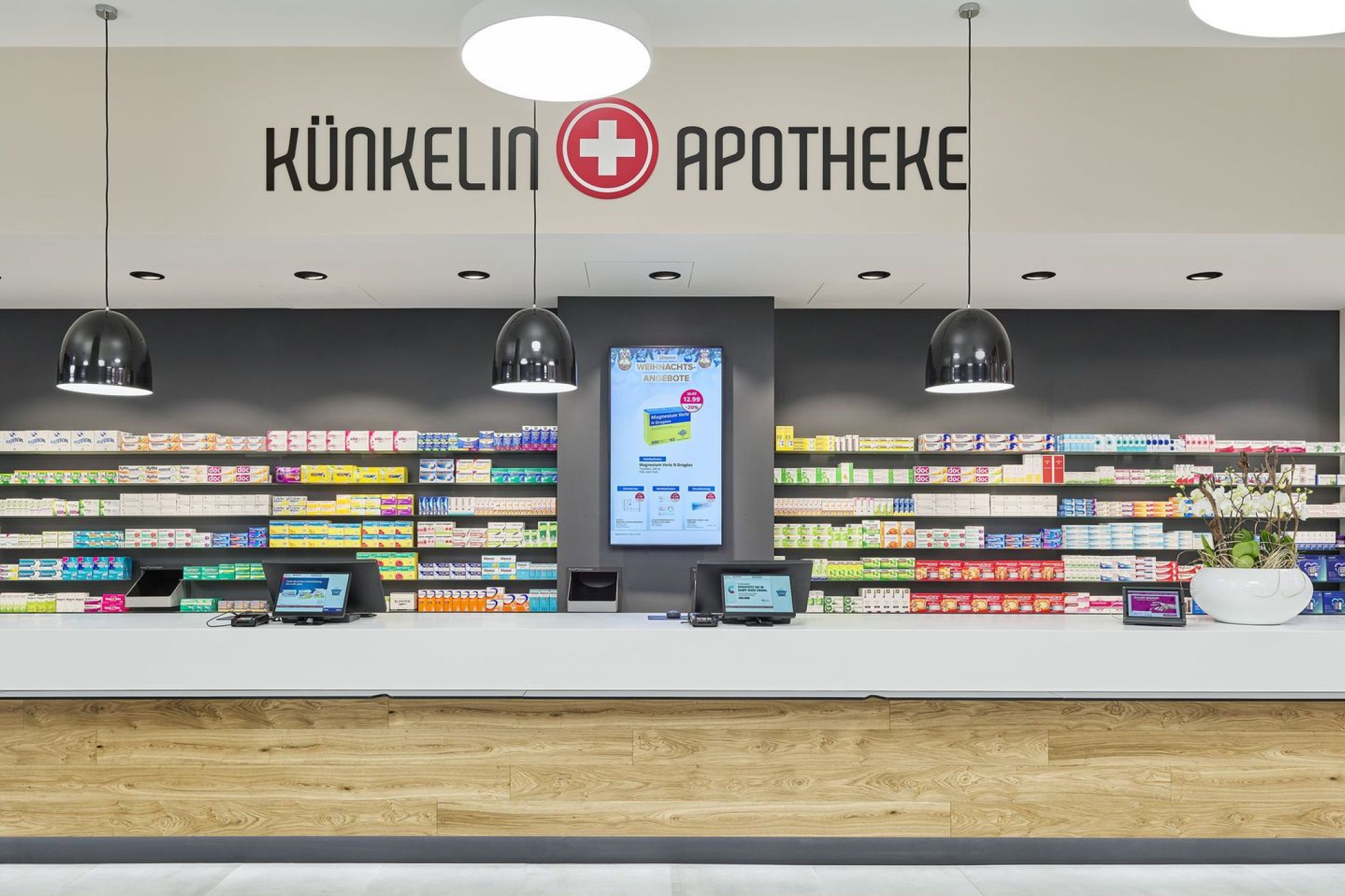 Front view of the checkout area of a pharmacy.