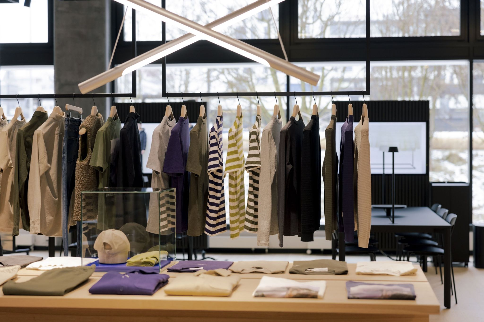 Interior view of the Marc O'Polo showroom by Visplay with a stylish, open layout and modern decor elements.