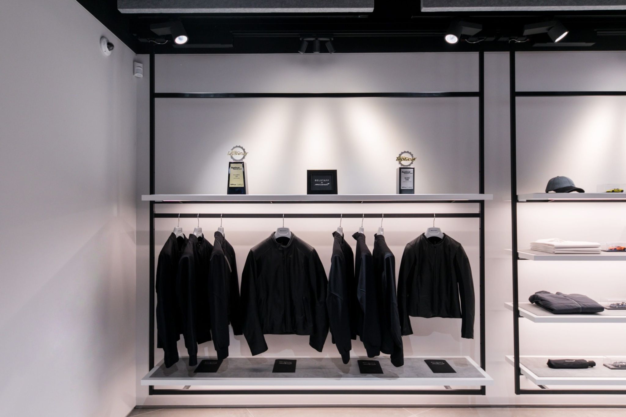 Detailed view of a goods carrier equipped with clothes.