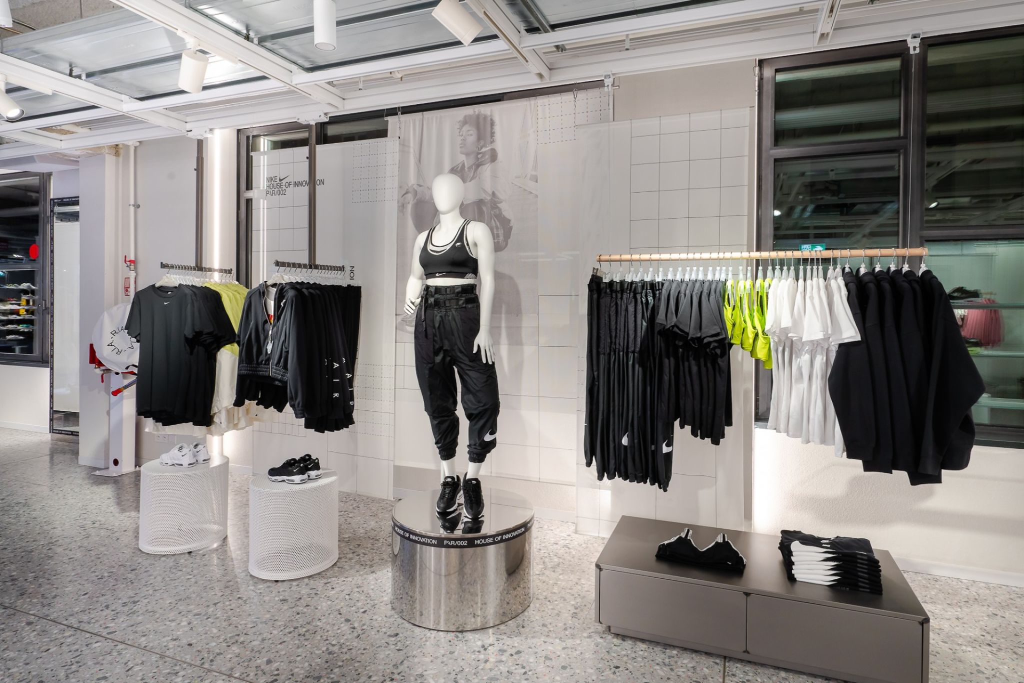 Merchandise carrier equipped with sportswear on the store floor of a sporting goods manufacturer.