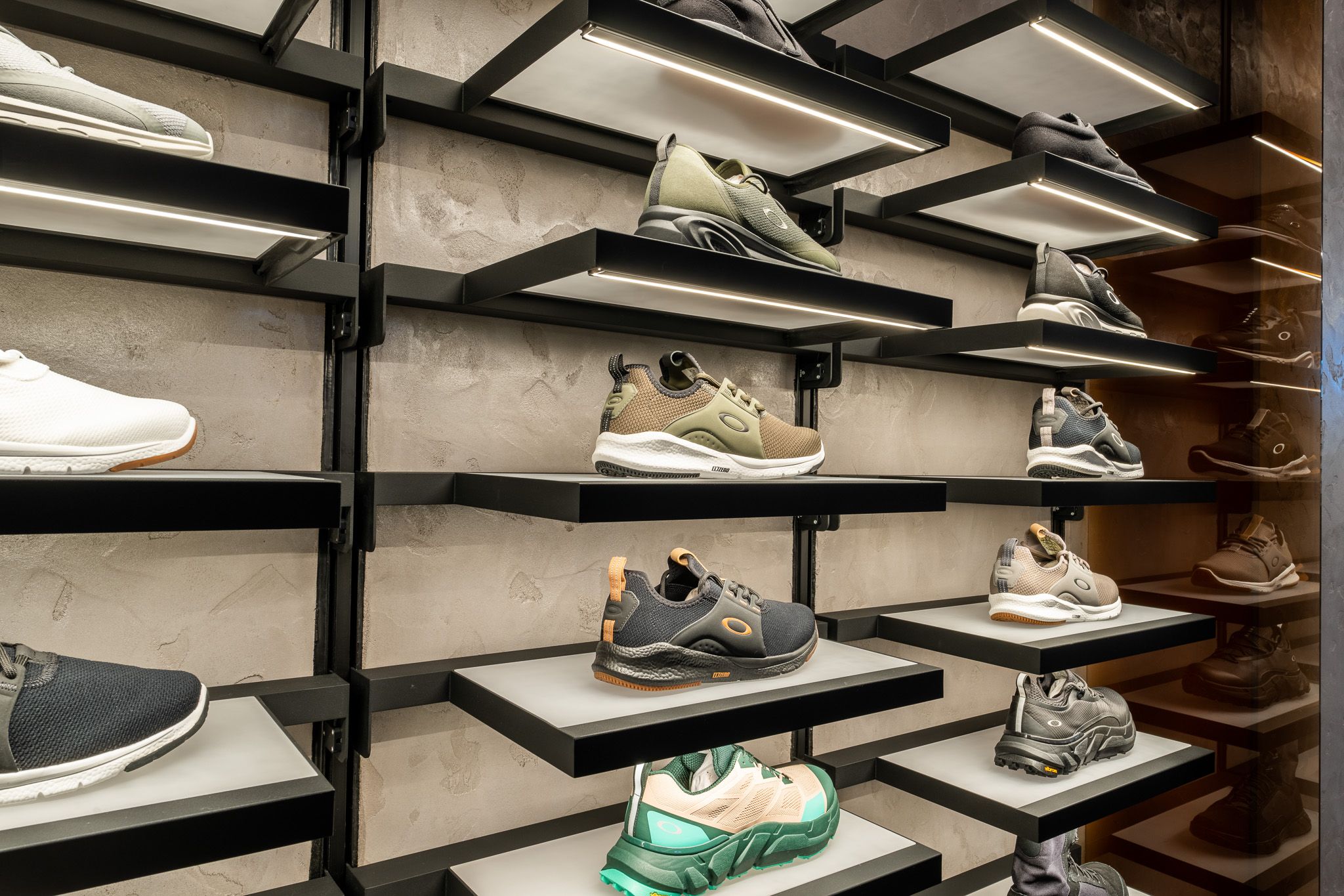 Visplay's flexible merchandise support systems display Oakley's footwear collection.