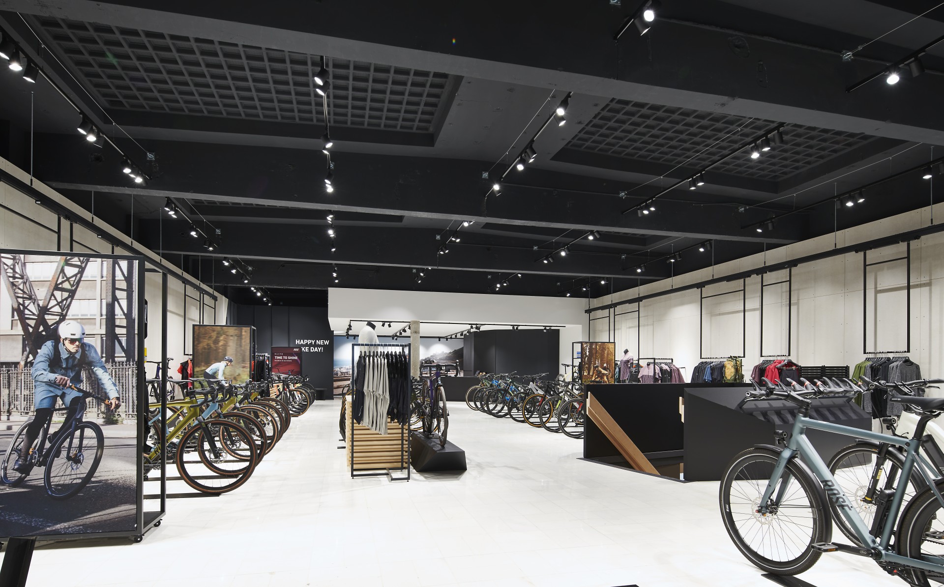 A large modern retail space of a bike store.