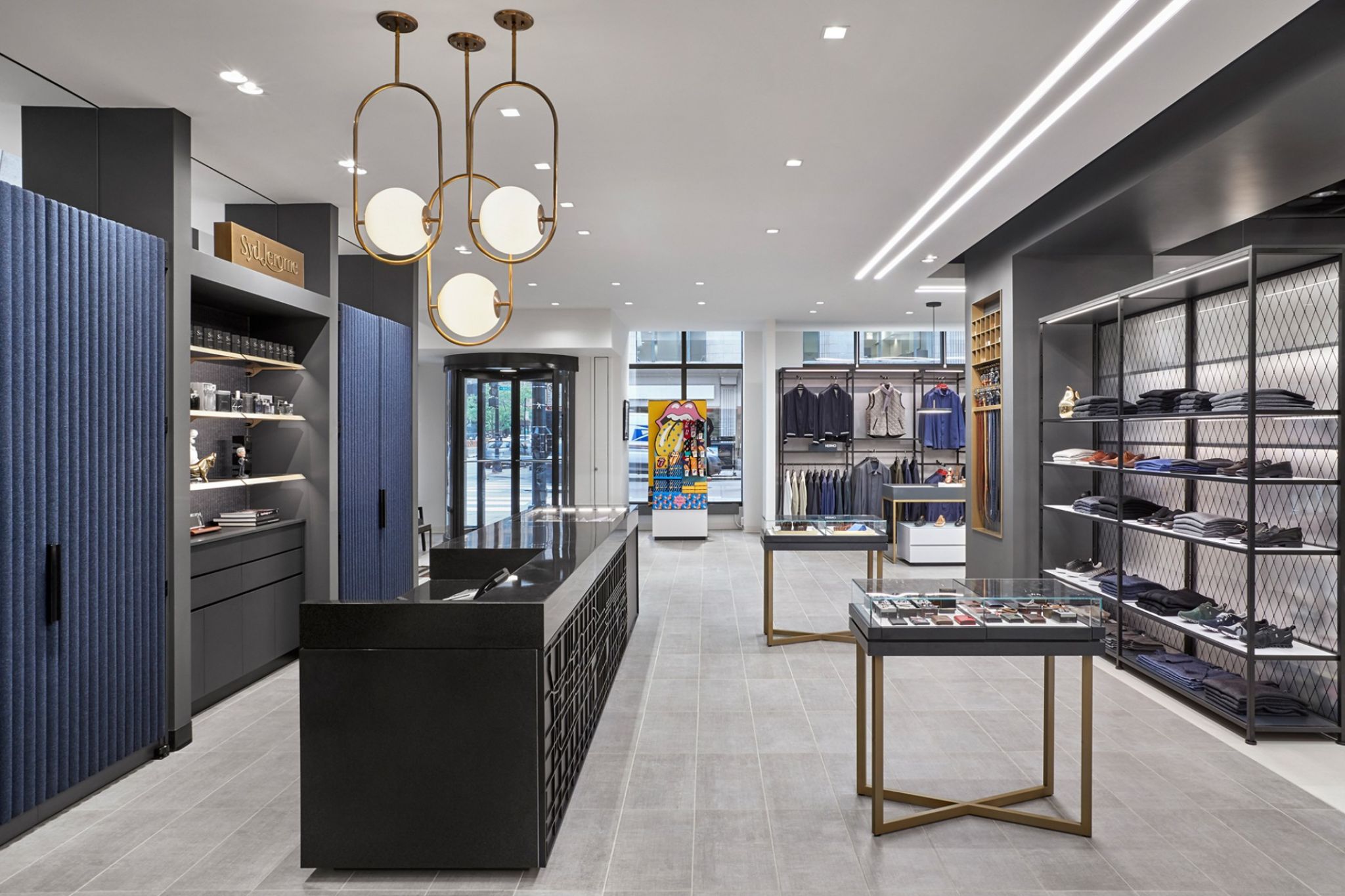 Retail space with a sales counter and merchandise racks.