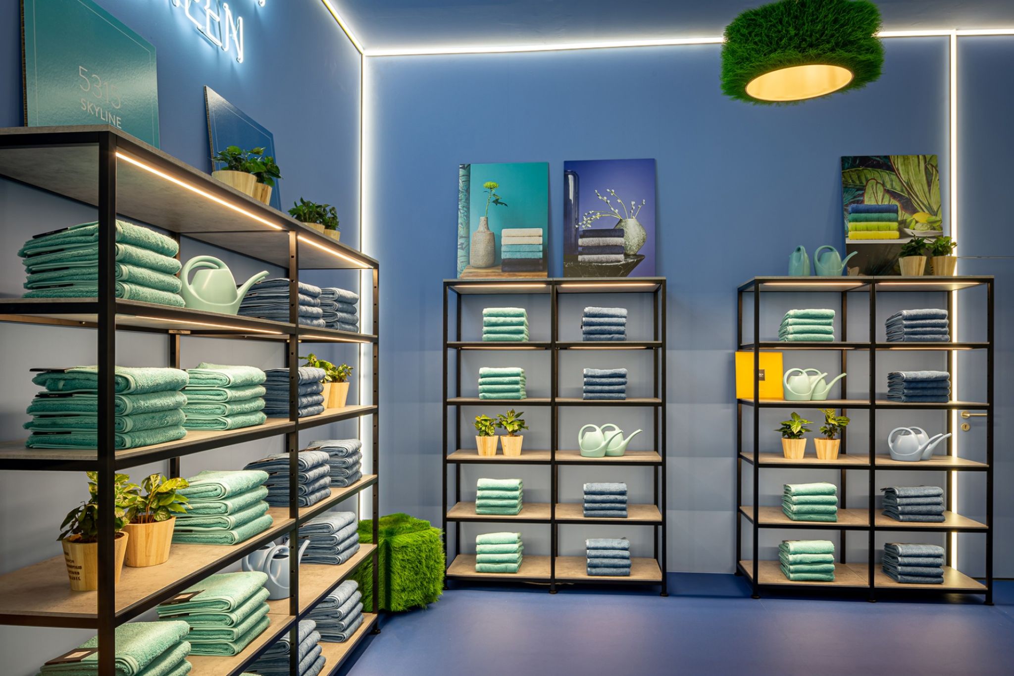 Shelves equipped with bathroom textiles.