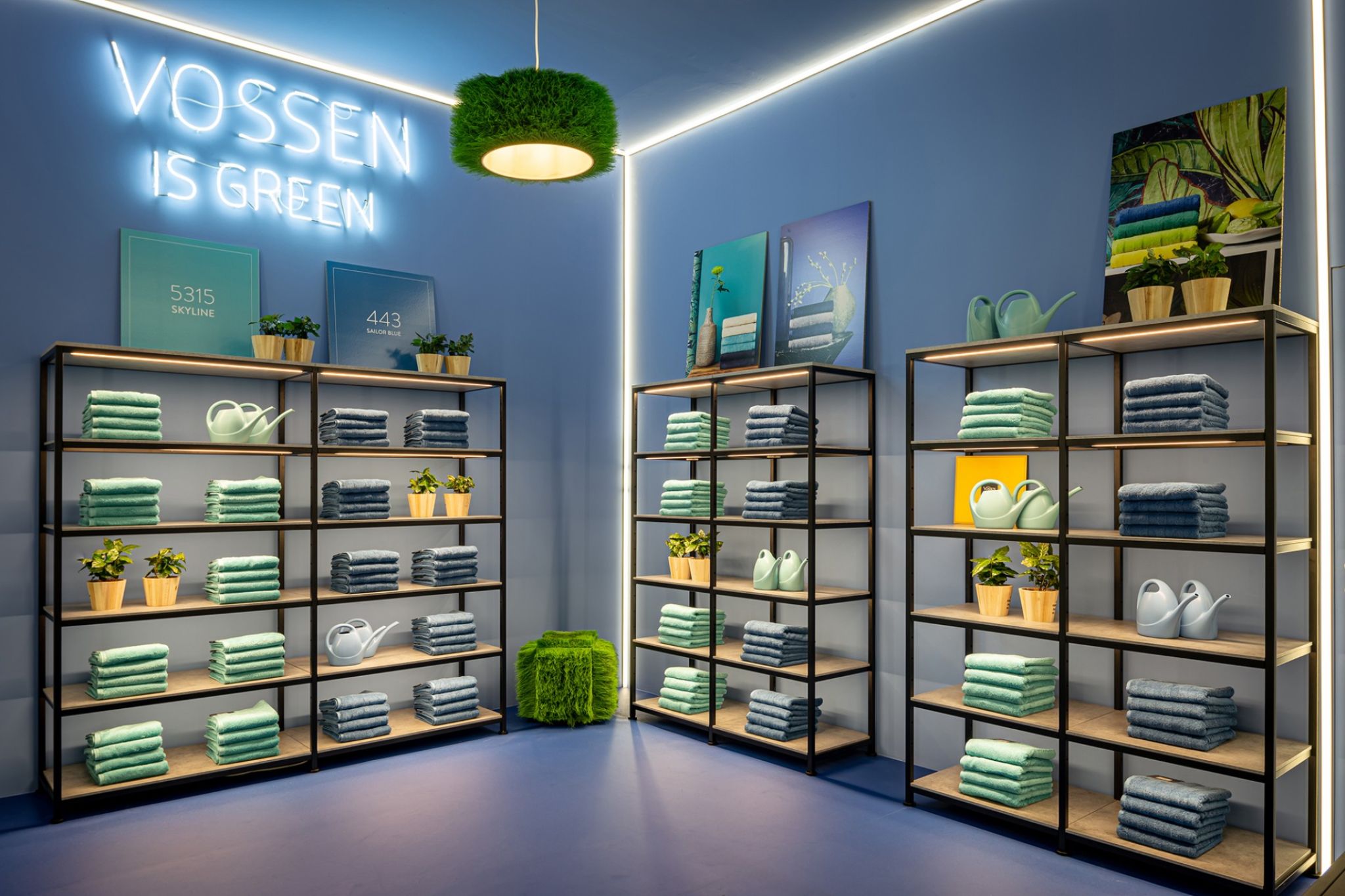 Decorated shelves in a room with blue walls.